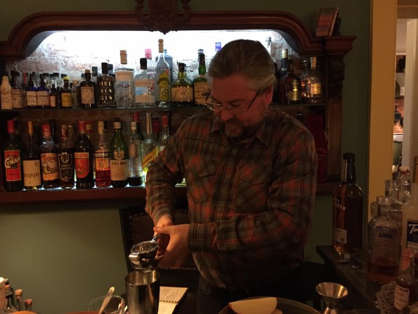 Our  mystery host behind the bar